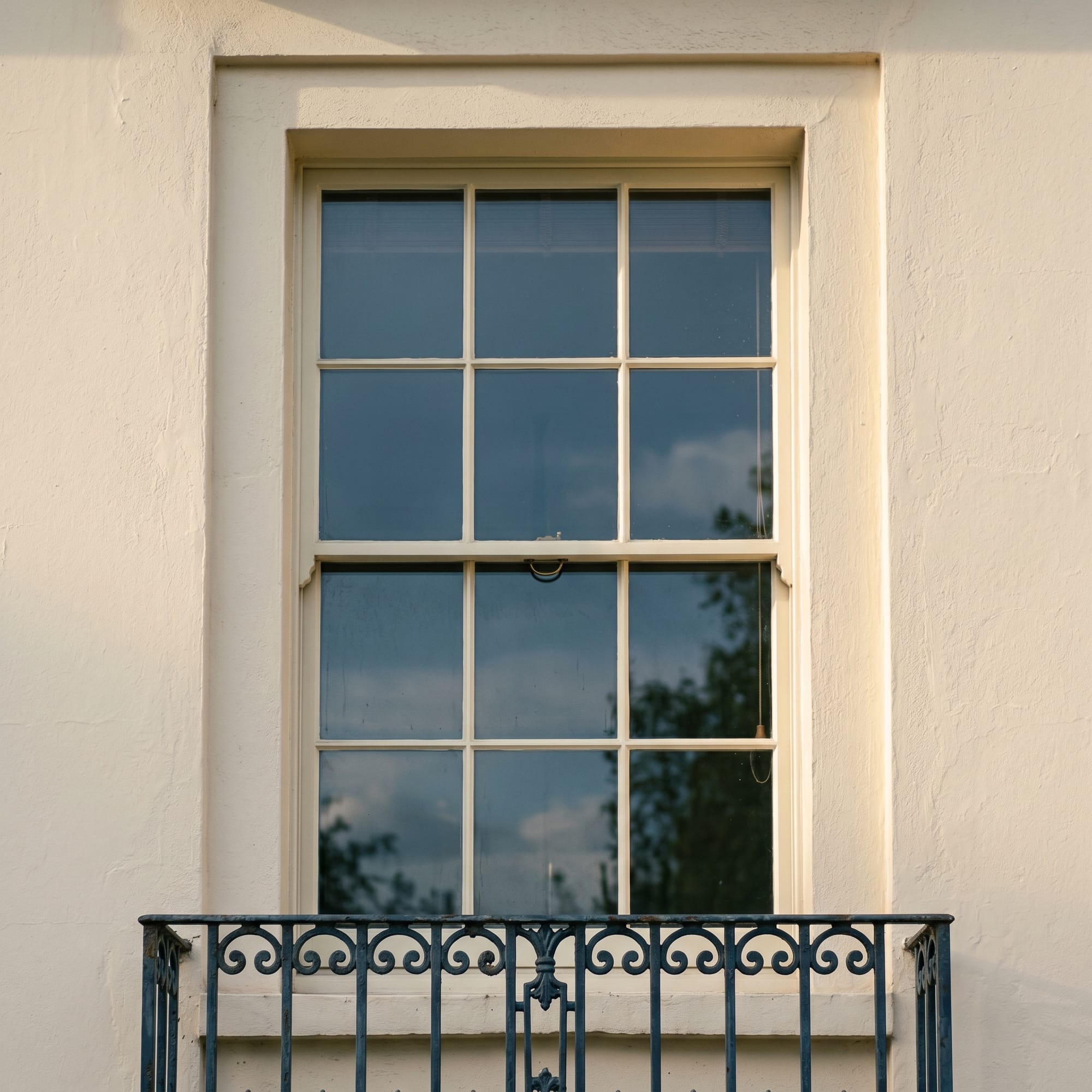 Detail of the original Cubitt fenestration — sash window, painted timber glazing bars.